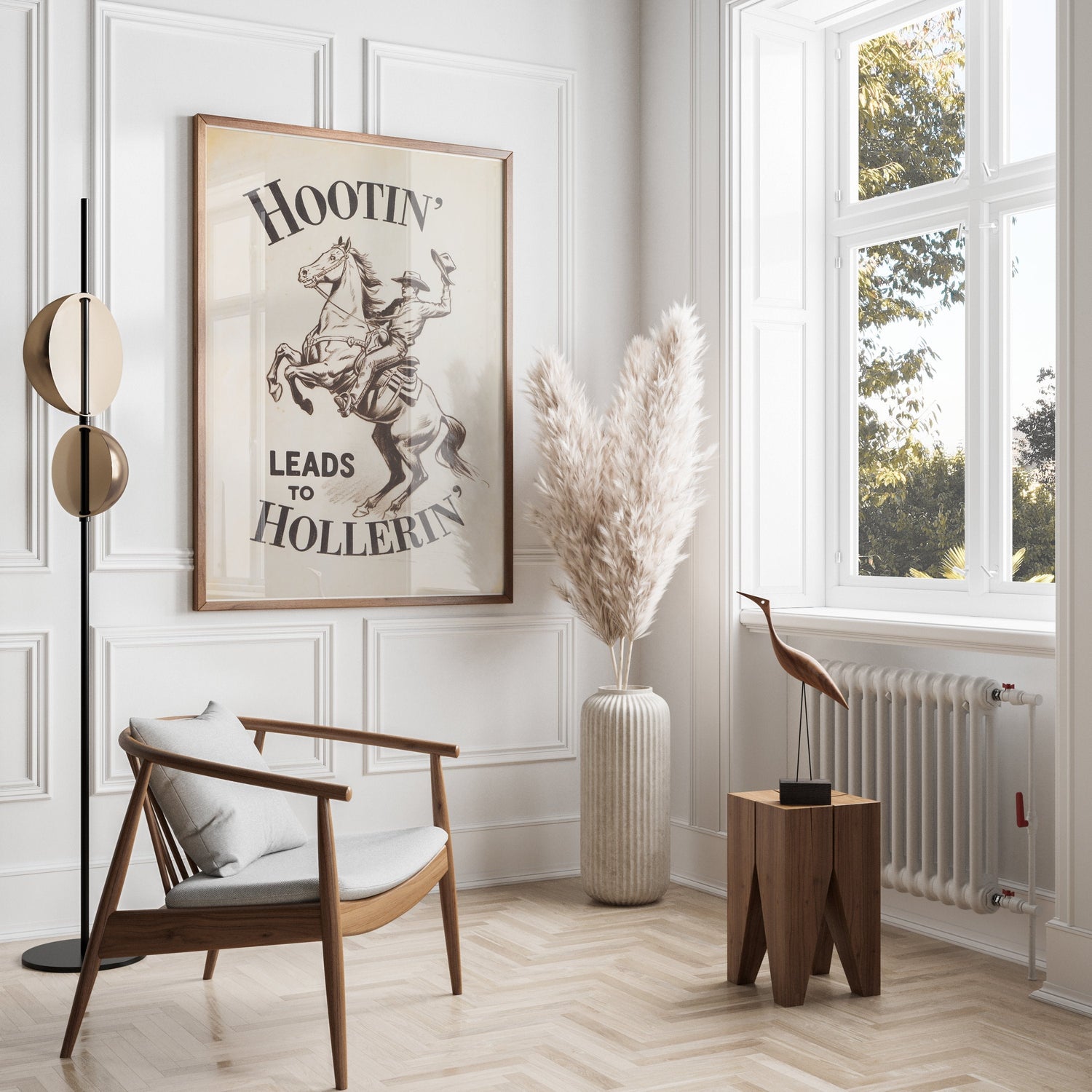 Modern Western-inspired interior with rustic decor, pampas grass, and a vintage 'Hootin' Leads to Hollerin'' poster.