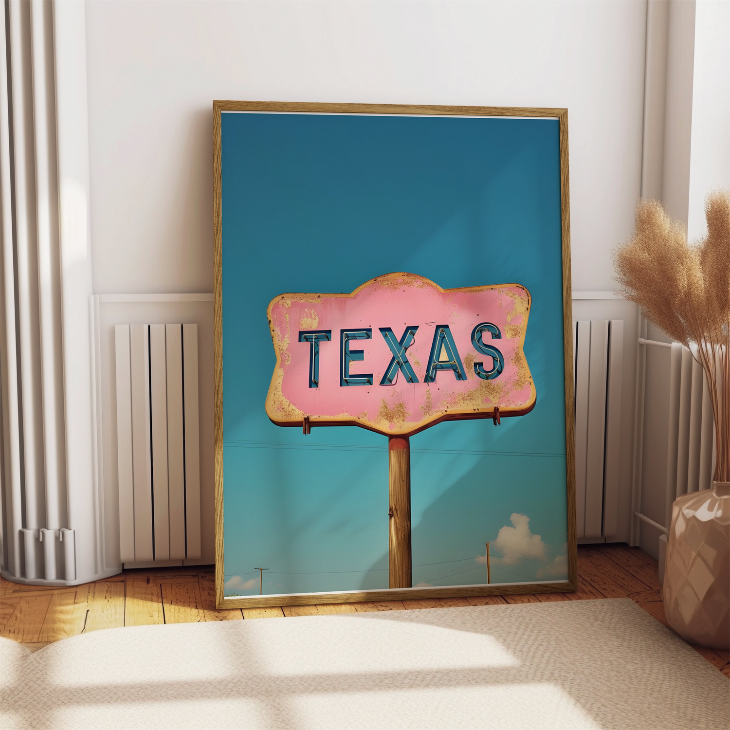 Vintage-style Texas sign artwork poster in a wooden frame, set in a sunlit room.