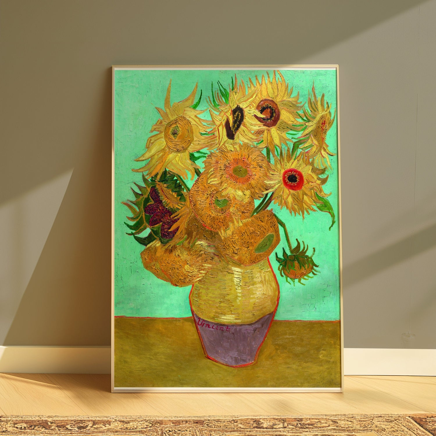 Framed Van Gogh sunflower painting with vibrant green background, leaning against a wall.