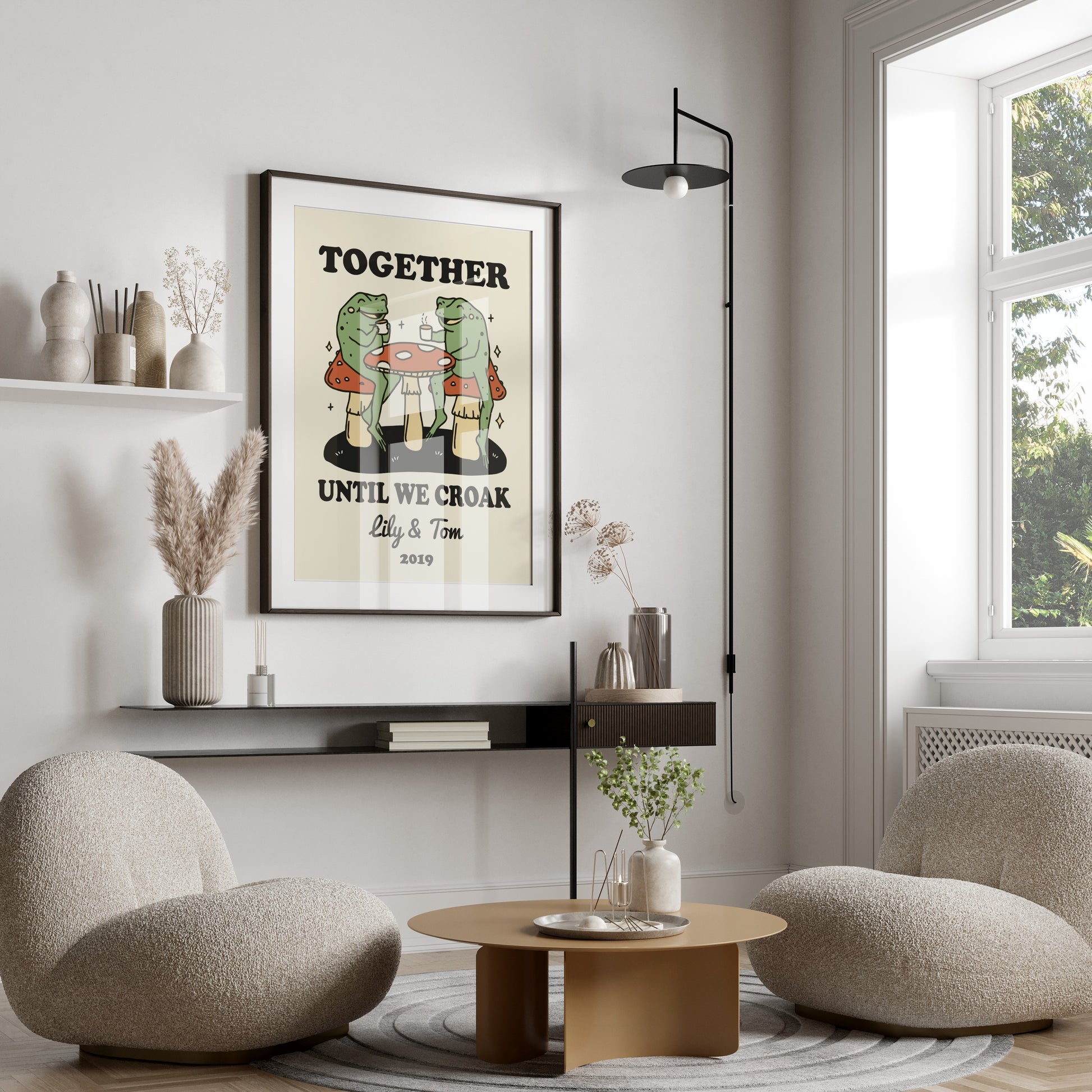Framed print of two anthropomorphic frogs sitting at a table with text "TOGETHER UNTIL WE CROAK".