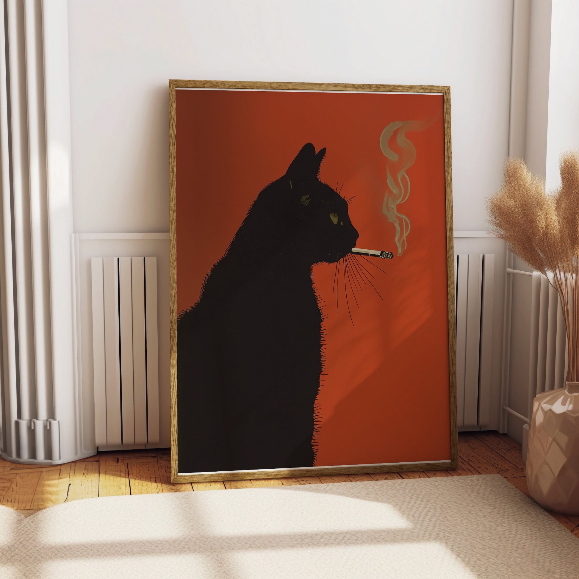 Framed art of a black cat with a cigarette, against an orange background.