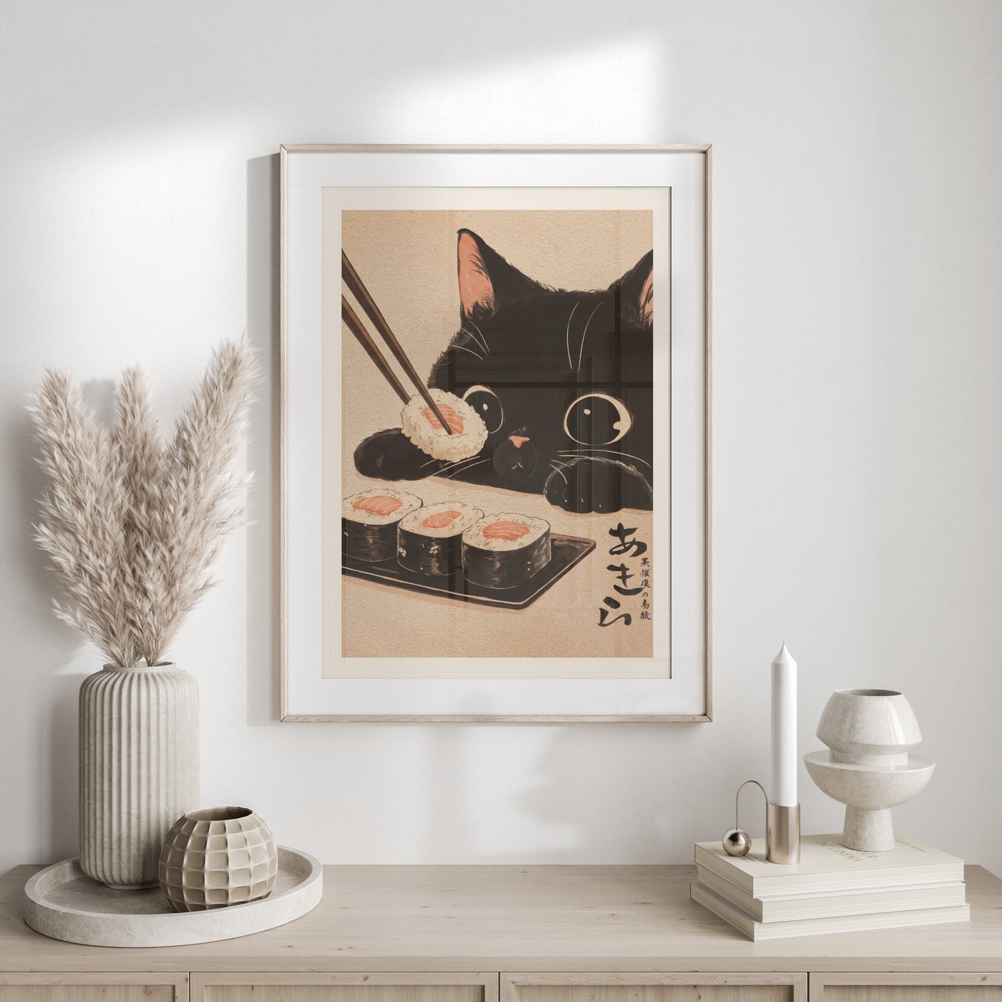 Black cat with chopsticks reaching for sushi on a framed print.