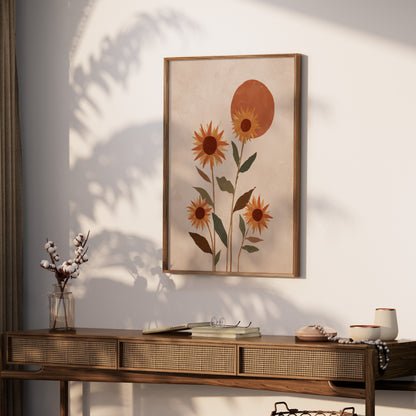 Framed abstract art of sunflowers and a sun against a textured background.