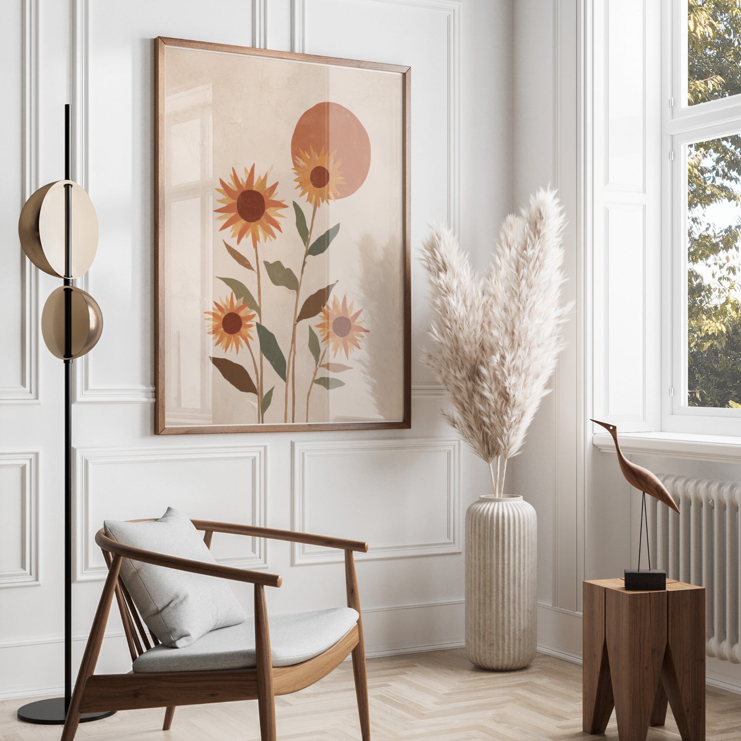 Sunflowers in a minimalist abstract painting above a wooden chair and floor lamp.