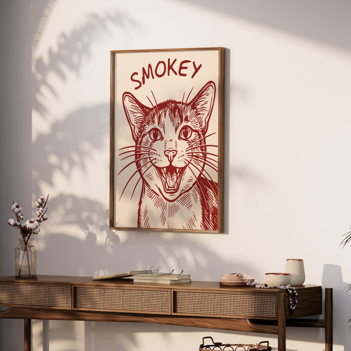 Framed drawing of a surprised cat with "SMOKEY" written above.