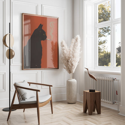 Black cat artwork on orange background hangs above wooden chair in sunlit room.