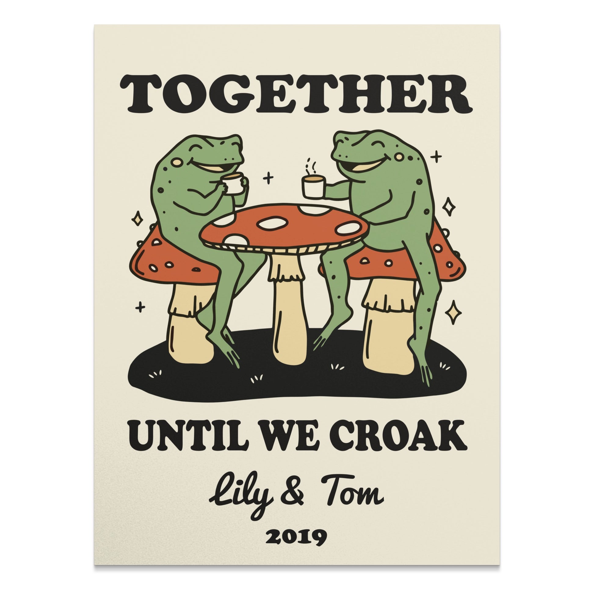 Two frogs sit at a mushroom table, drinking coffee with text "TOGETHER UNTIL WE CROAK Lily & Tom 2019".