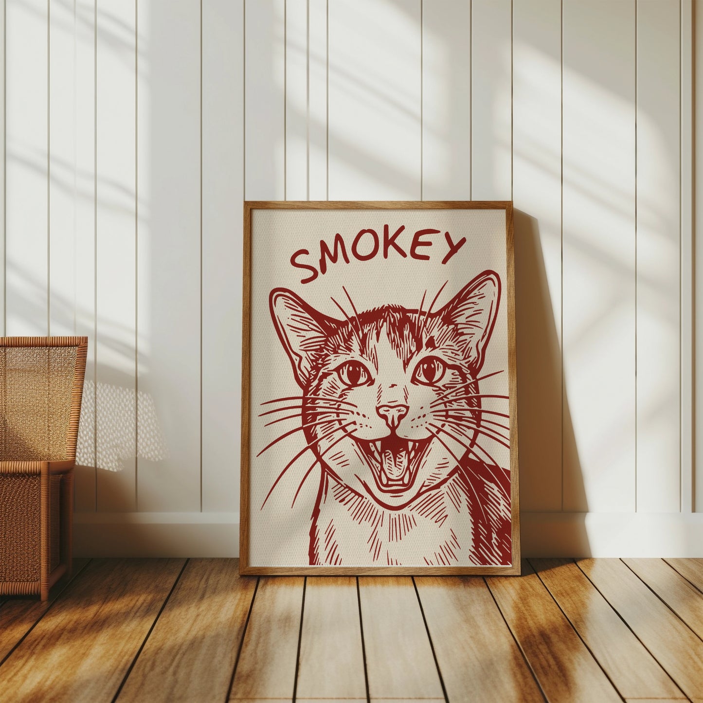 Framed sketch of a happy cat's face with "SMOKEY" text above.