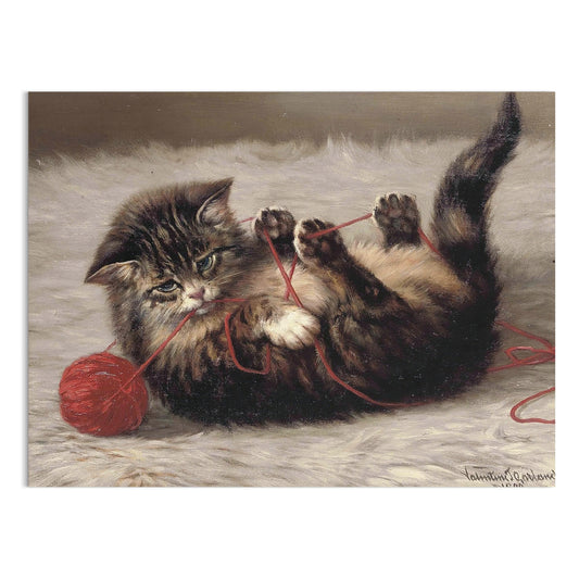 Premium Poster of Adorable Kitten Playing with Red Yarn Ball Posters