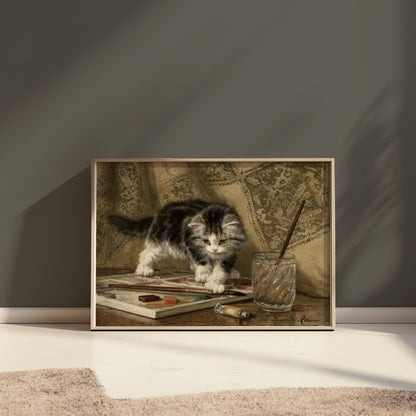 Premium Poster of Adorable Kitten Standing On Art Supplies Posters