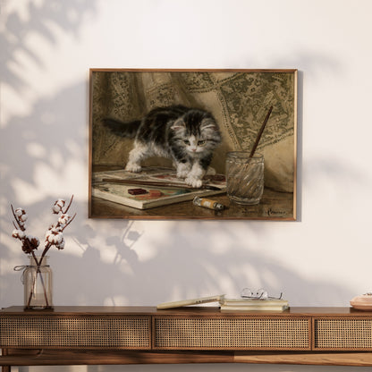 Premium Poster of Adorable Kitten Standing On Art Supplies Posters