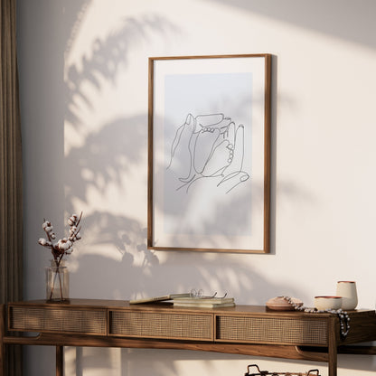 Premium Poster of Artistic Hand Holding Baby Feet Sketch Posters