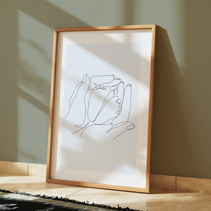Premium Poster of Artistic Hand Holding Baby Feet Sketch Posters