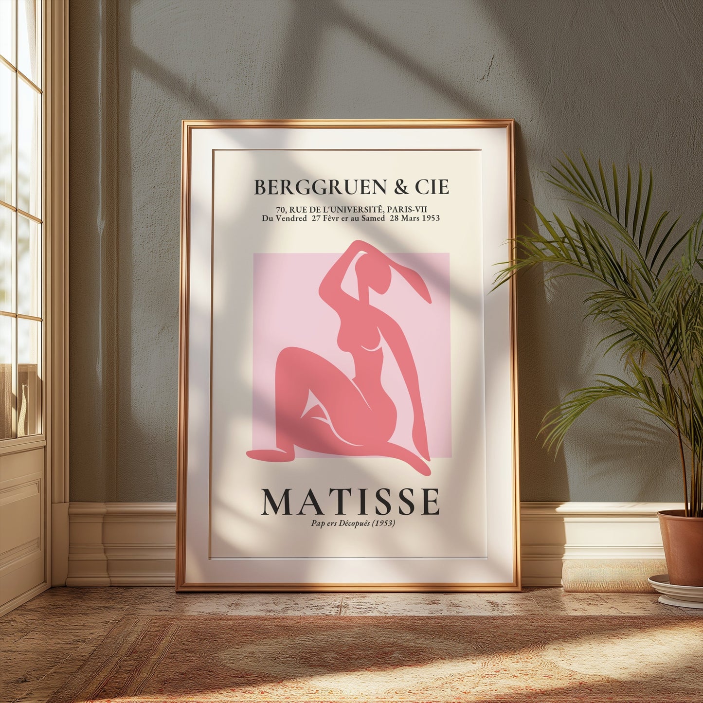 BERGGRUEN & CIE Matisse exhibition vintage poster in a wooden frame, displayed in a cozy room with plants and soft natural lighting.