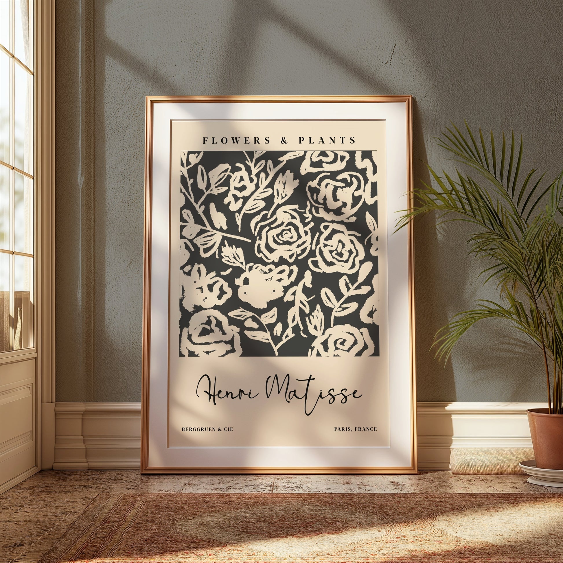 Henri Matisse floral art print in a gold frame, placed near a potted plant in a sunlit room, ideal for elegant wall decor.