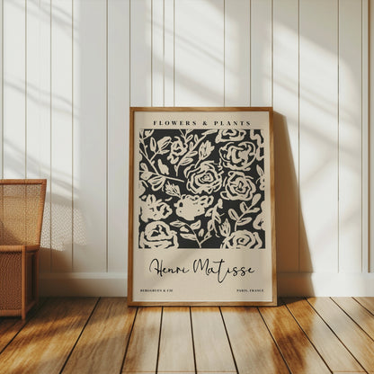 Henri Matisse floral art print in a wooden frame, placed on a wooden floor with natural light, perfect for modern home decor.