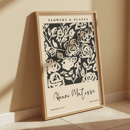 Henri Matisse floral art print in a wooden frame, leaning against a beige wall with soft shadows, ideal for minimalist interiors.