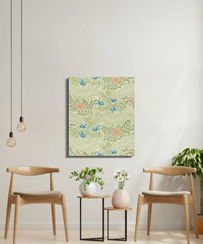 William Morris floral canvas wrap with green leaves and blue flowers, styled in a bright sitting area with wooden chairs and plants.