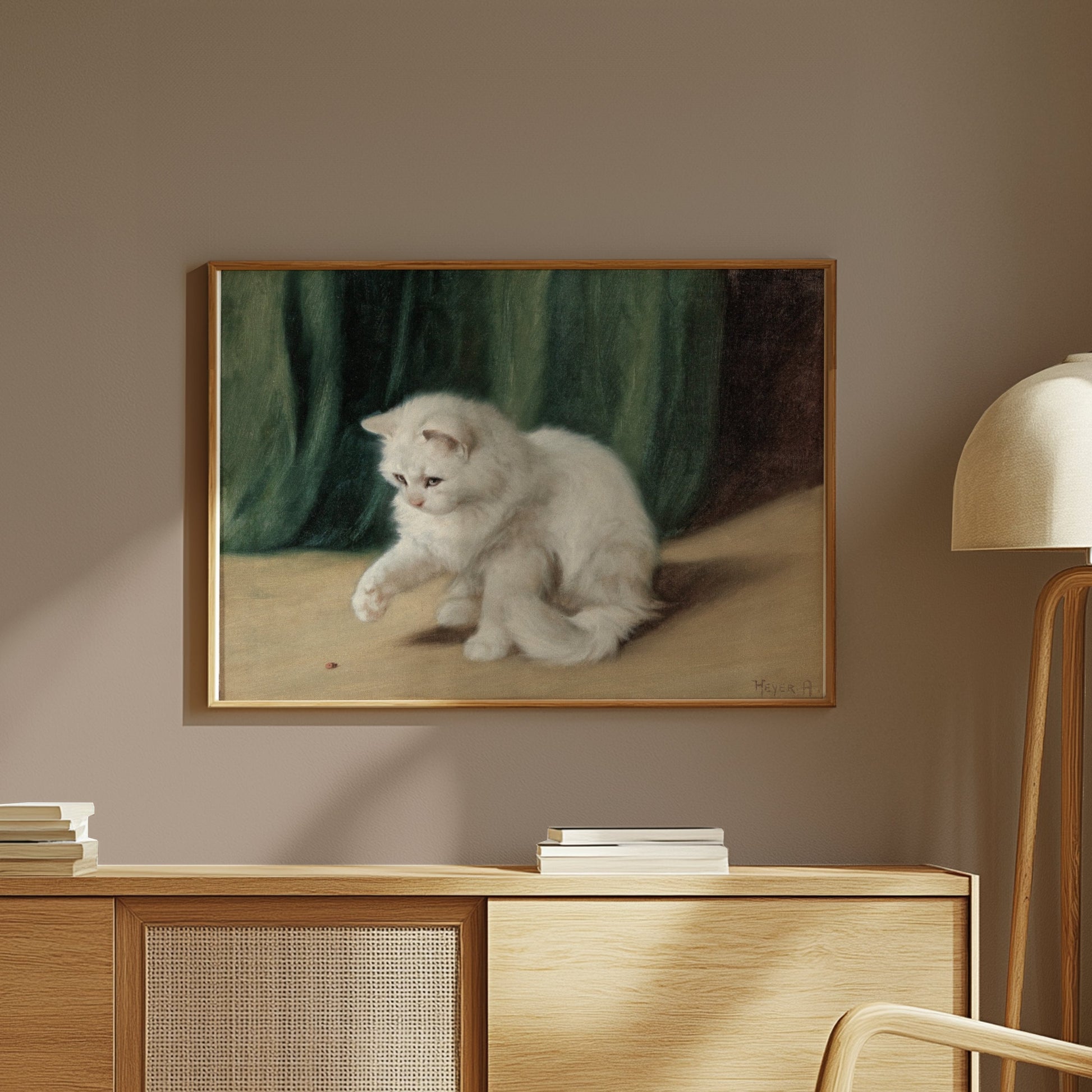 Premium Poster of Charming White Cat Playing with a Ladybird Posters