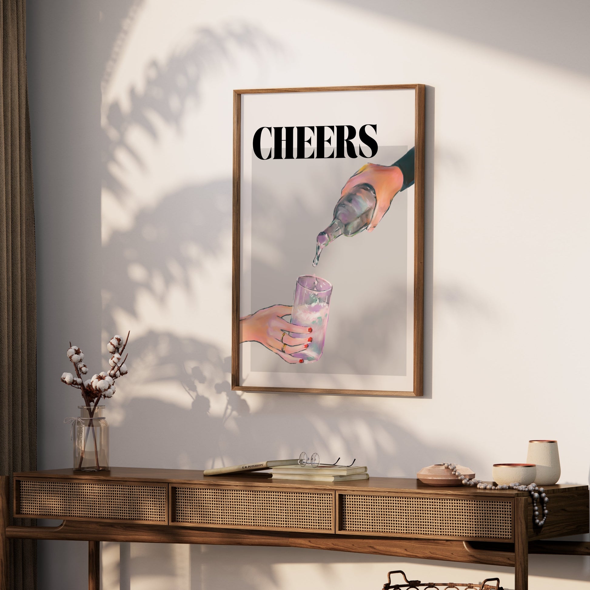 Premium Poster of Cheers Water Pour Hand Holding Glass Posters