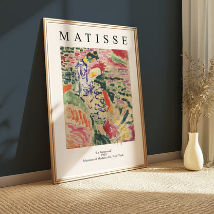 Matisse La Japonaise poster leaning against a dark green wall with natural lighting. A stunning addition to any art lover's collection.