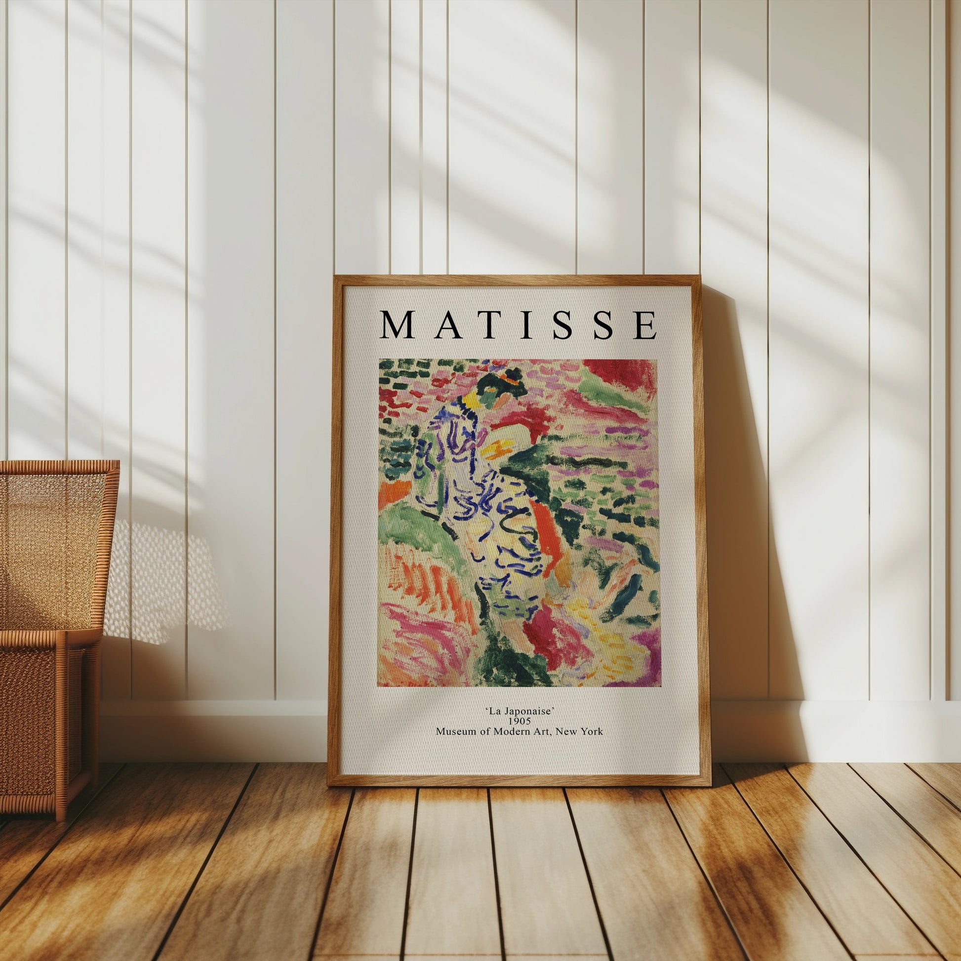 Matisse La Japonaise poster leaning against a white paneled wall with wooden flooring. A timeless piece for art-inspired interiors.