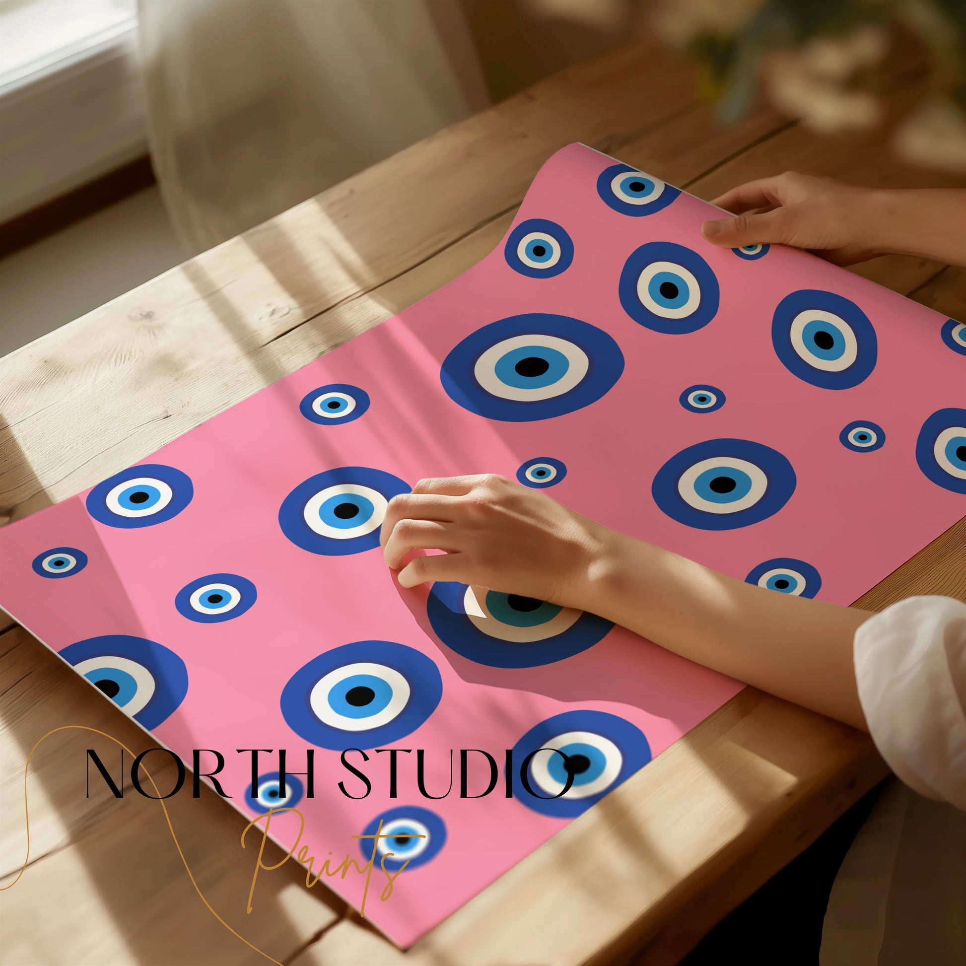 Premium Poster of Colorful Blue Eye Pattern on Pink Background Posters