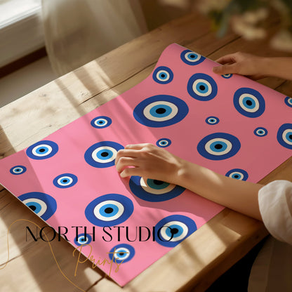 Premium Poster of Colorful Blue Eye Pattern on Pink Background Posters