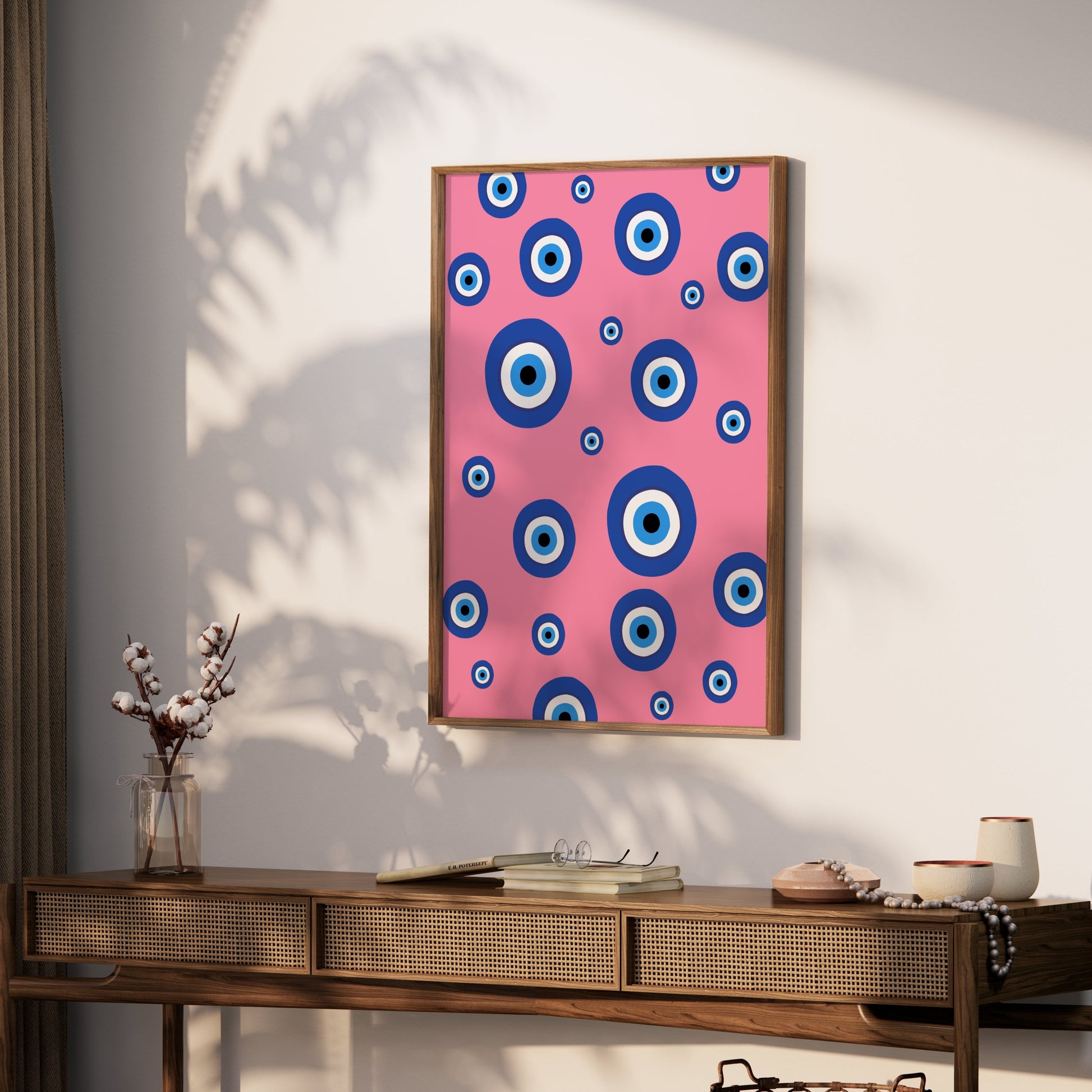 Premium Poster of Colorful Blue Eye Pattern on Pink Background Posters