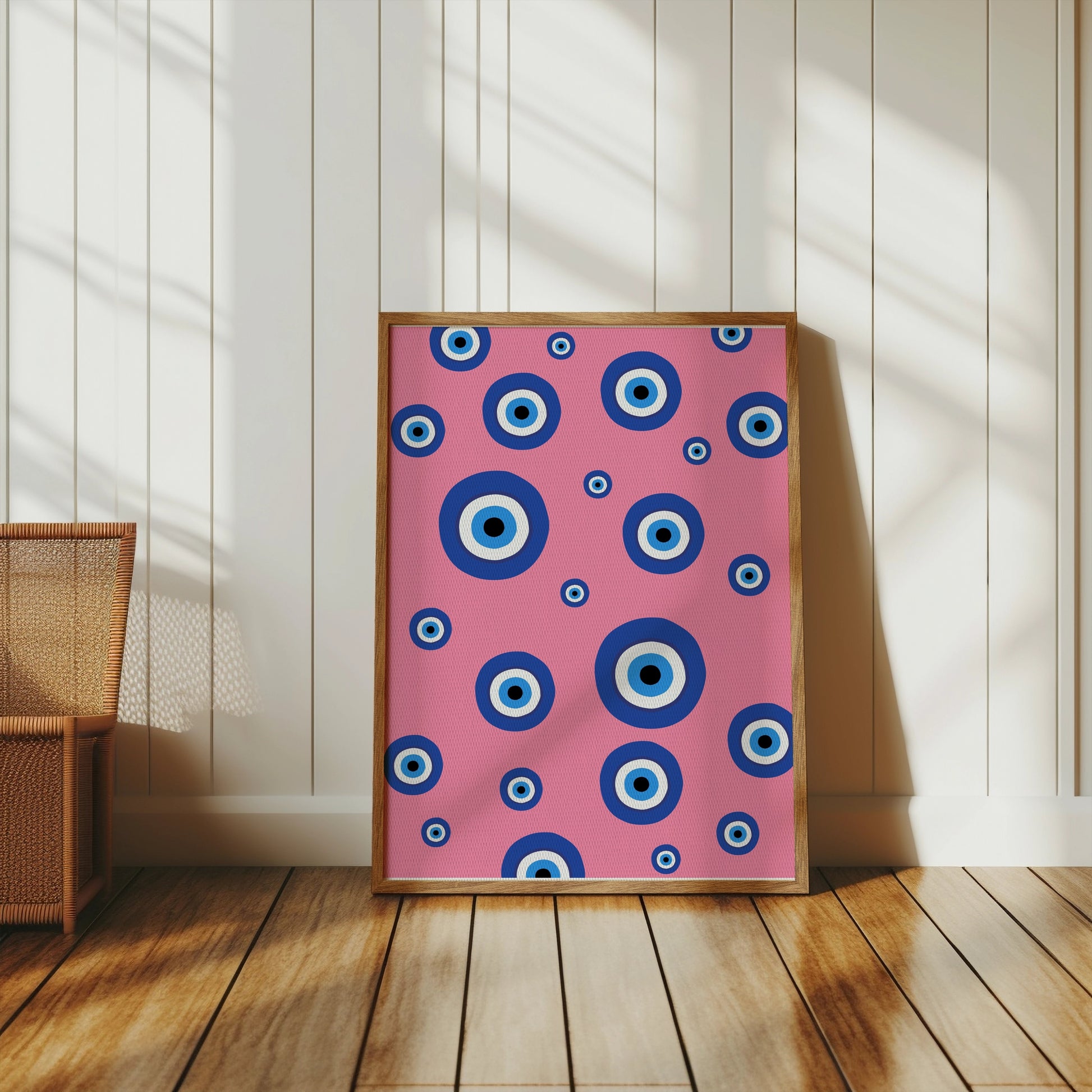 Premium Poster of Colorful Blue Eye Pattern on Pink Background Posters