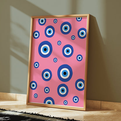 Premium Poster of Colorful Blue Eye Pattern on Pink Background Posters