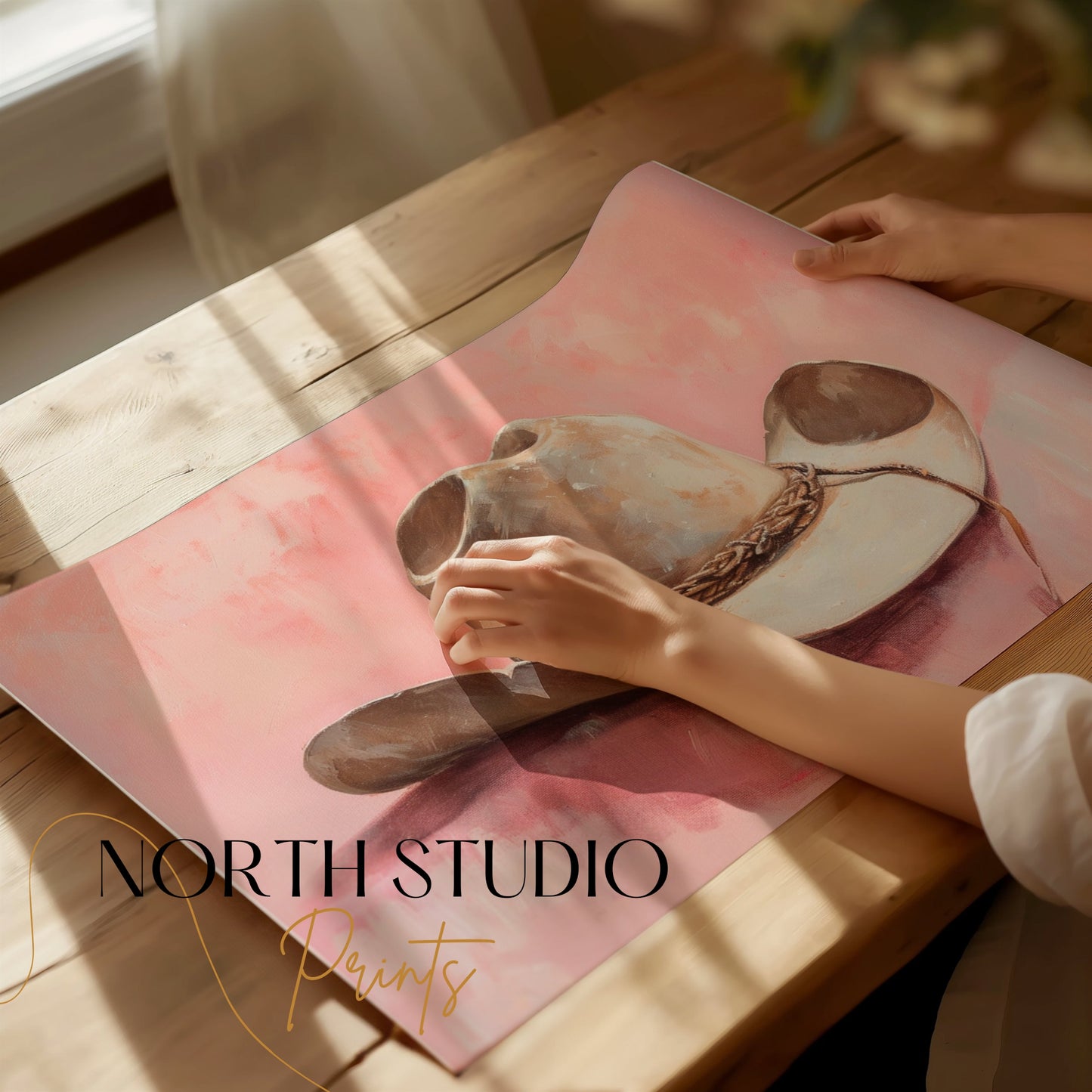 Premium Poster of Cowboy Hat on Pastel Pink Background Posters
