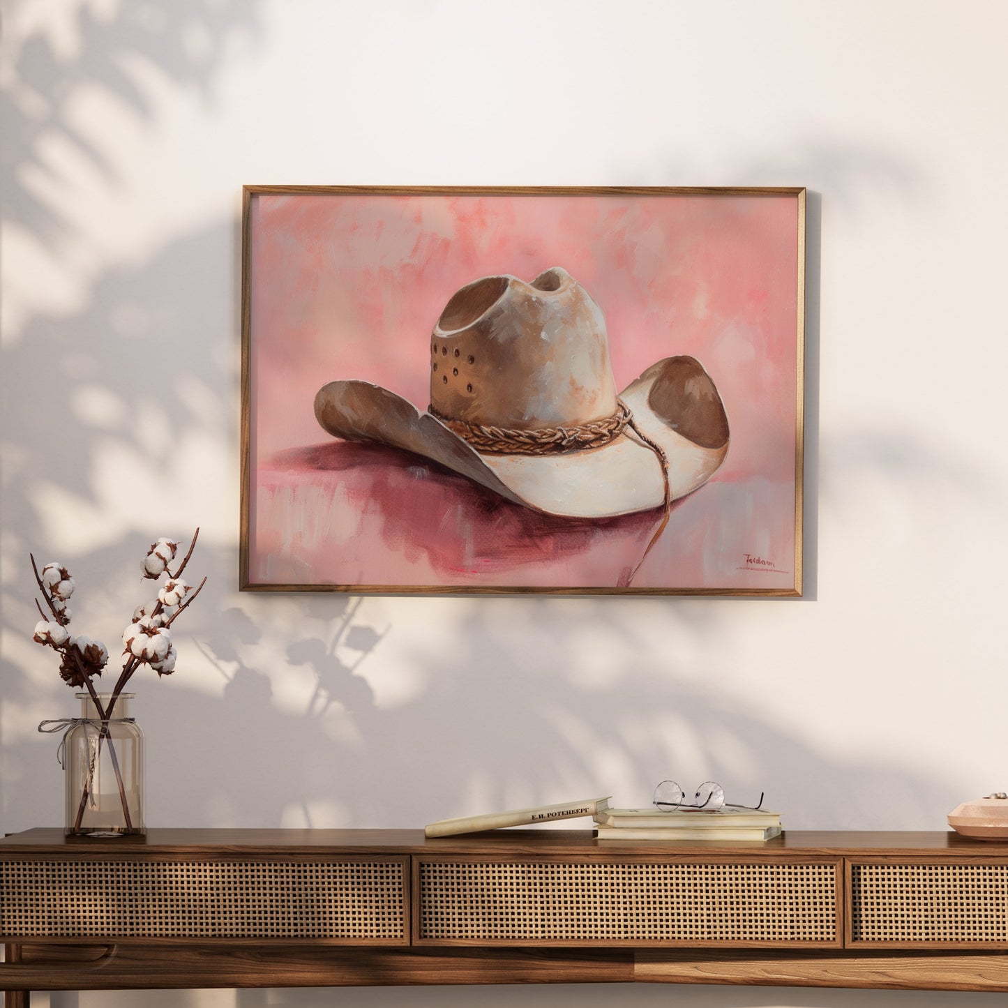 Premium Poster of Cowboy Hat on Pastel Pink Background Posters