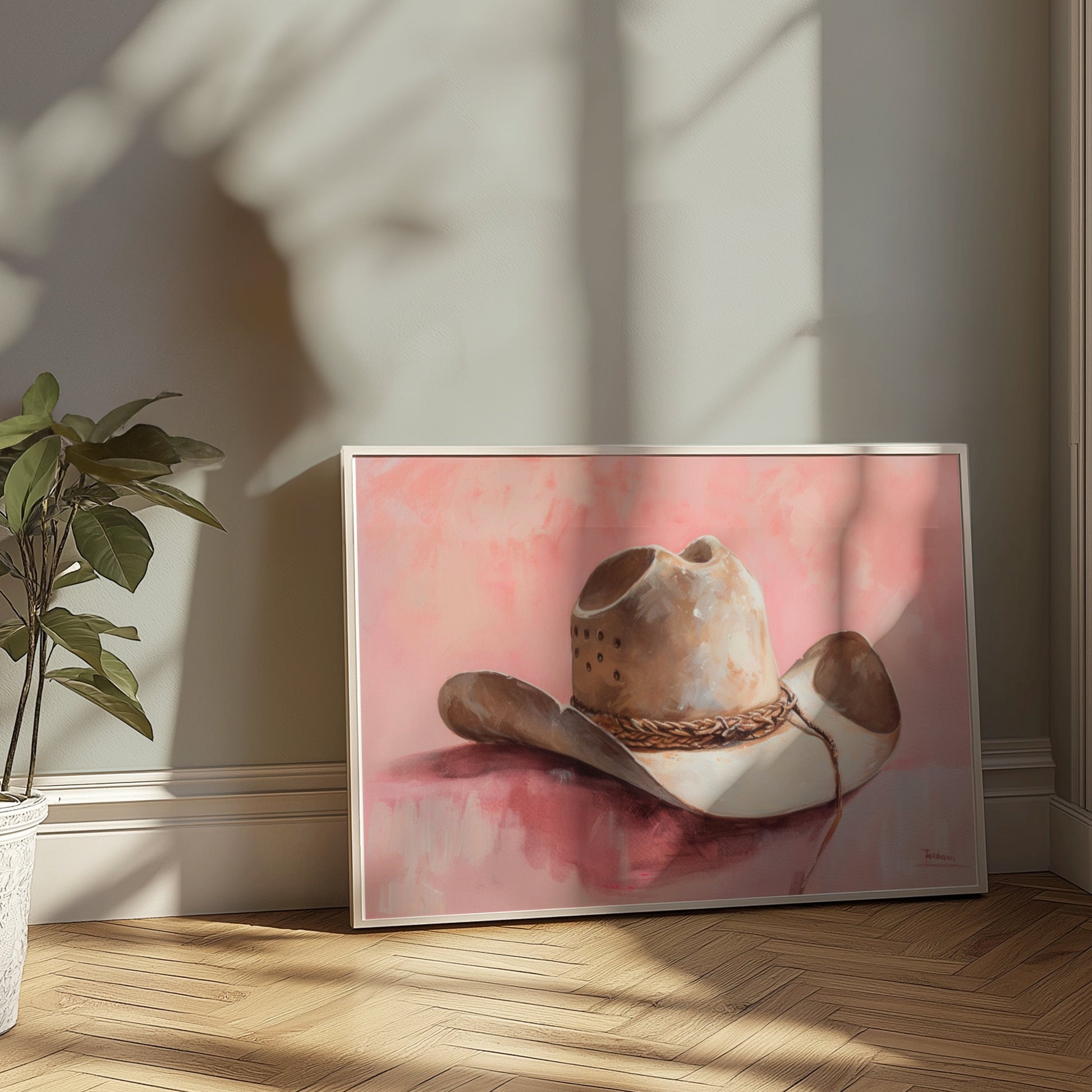 Premium Poster of Cowboy Hat on Pastel Pink Background Posters