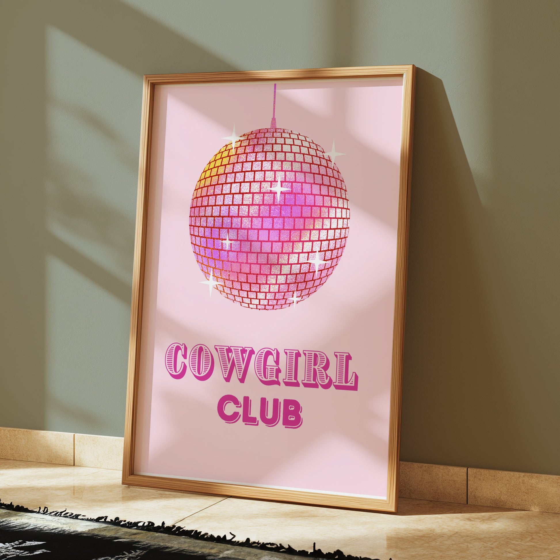 Premium Poster of Cowgirl Club Disco Ball Sparkles on Pink Background Posters