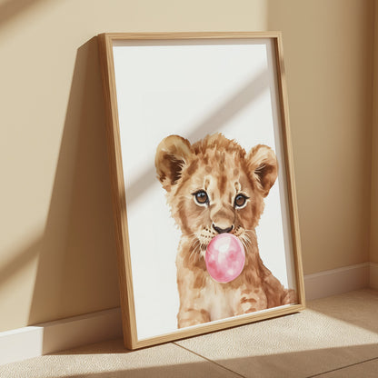 Premium Poster of Cute Lion Cub Blowing Bubblegum Posters
