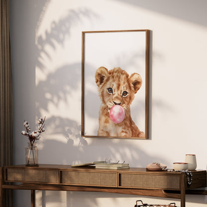 Premium Poster of Cute Lion Cub Blowing Bubblegum Posters