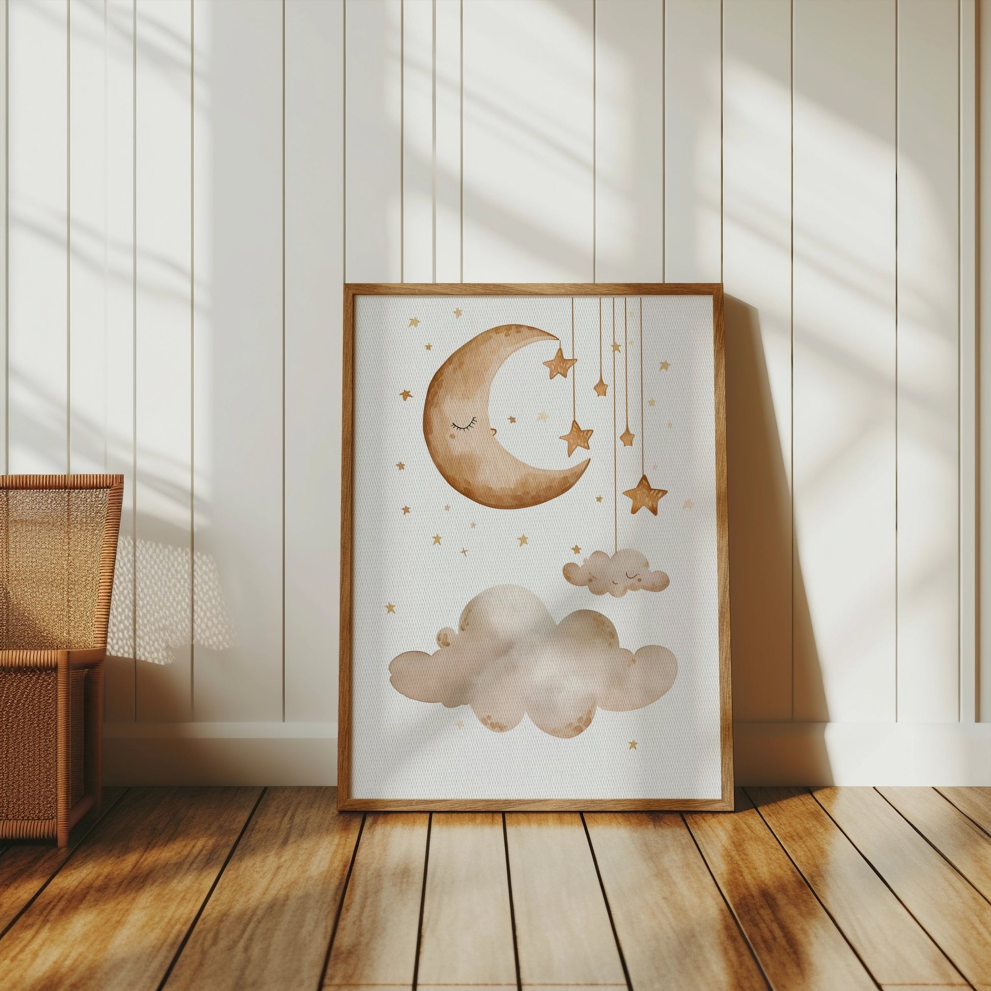 Dreamy celestial wall art featuring a crescent moon, stars, and clouds, leaning against a white paneled wall in a cozy, sunlit room.