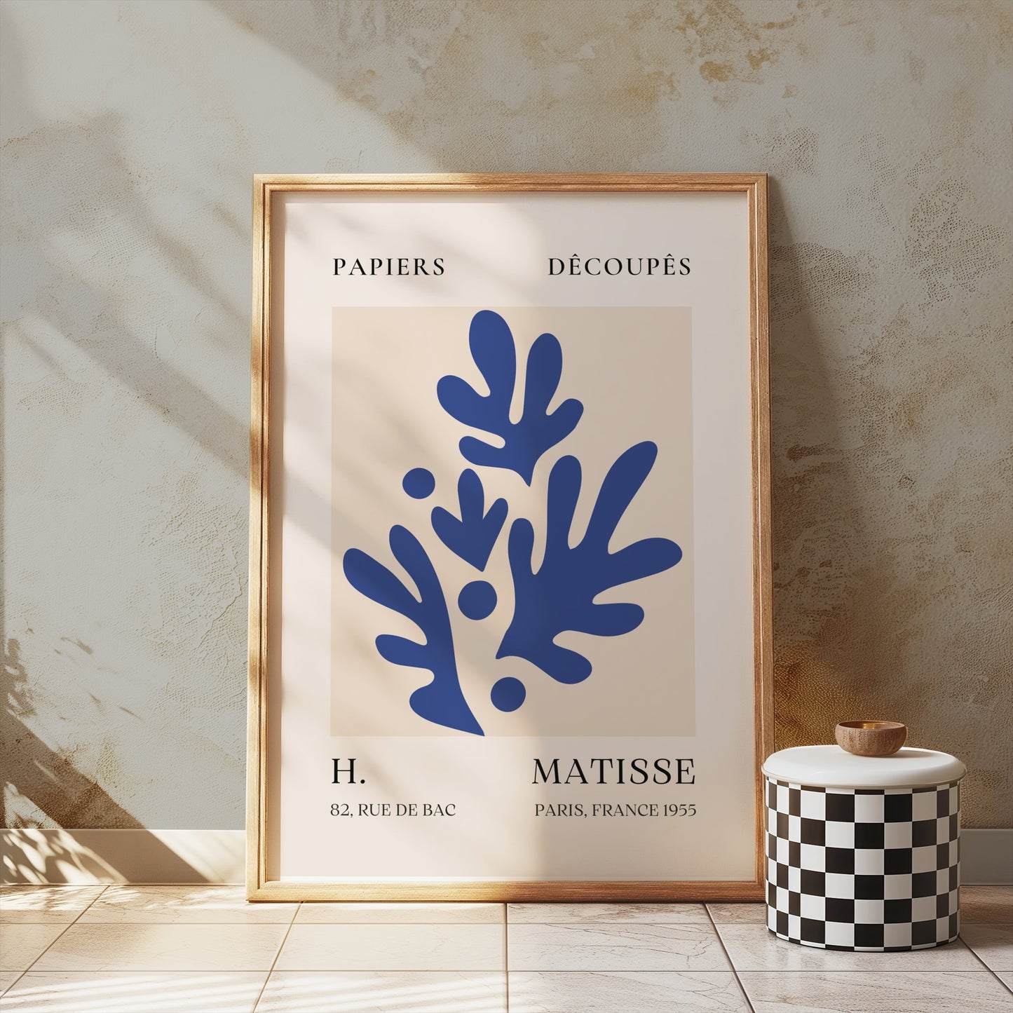 Matisse-inspired decorative poster in a wooden frame, displayed on a textured wall with soft lighting and minimalist decor.