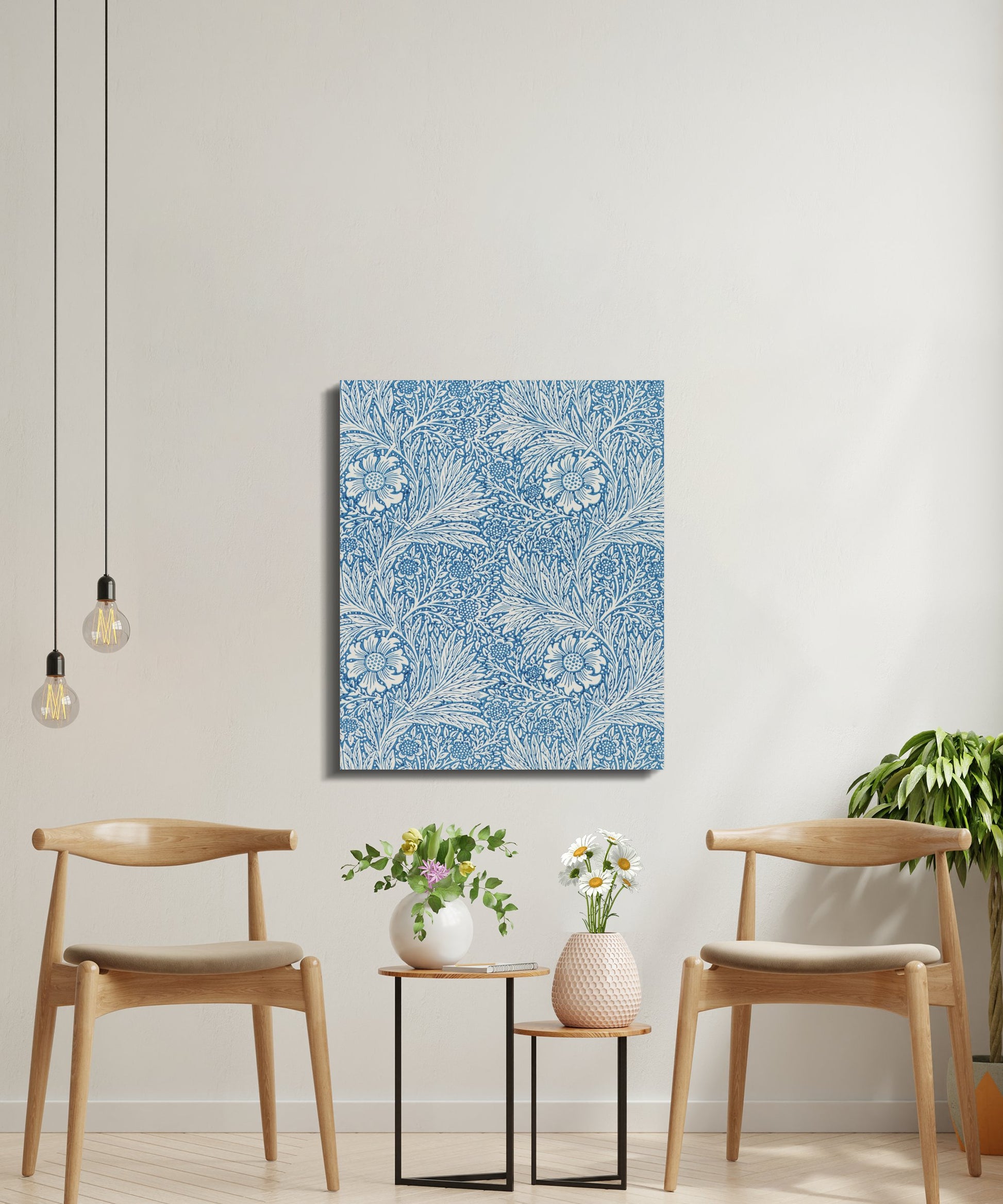William Morris floral canvas wrap displayed in a minimalist seating area with wooden chairs and plants, enhancing the space with vintage elegance.