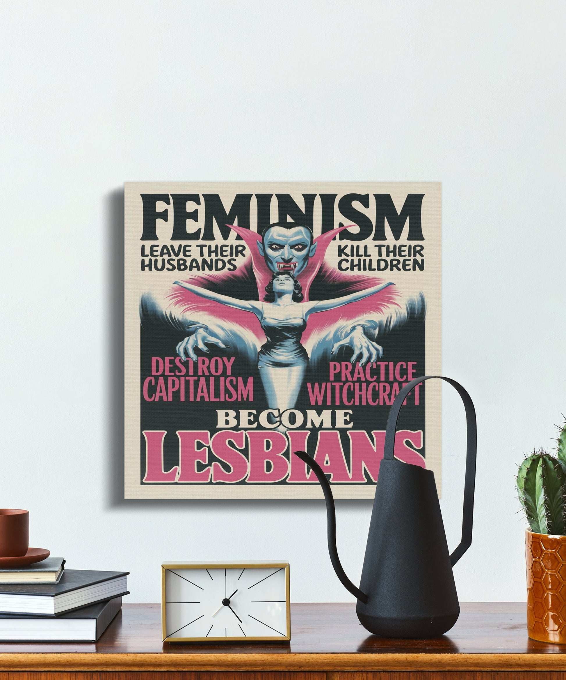 Satirical feminist art canvas wrap on a minimalist shelf with decor items, highlighting bold text and dramatic design elements.