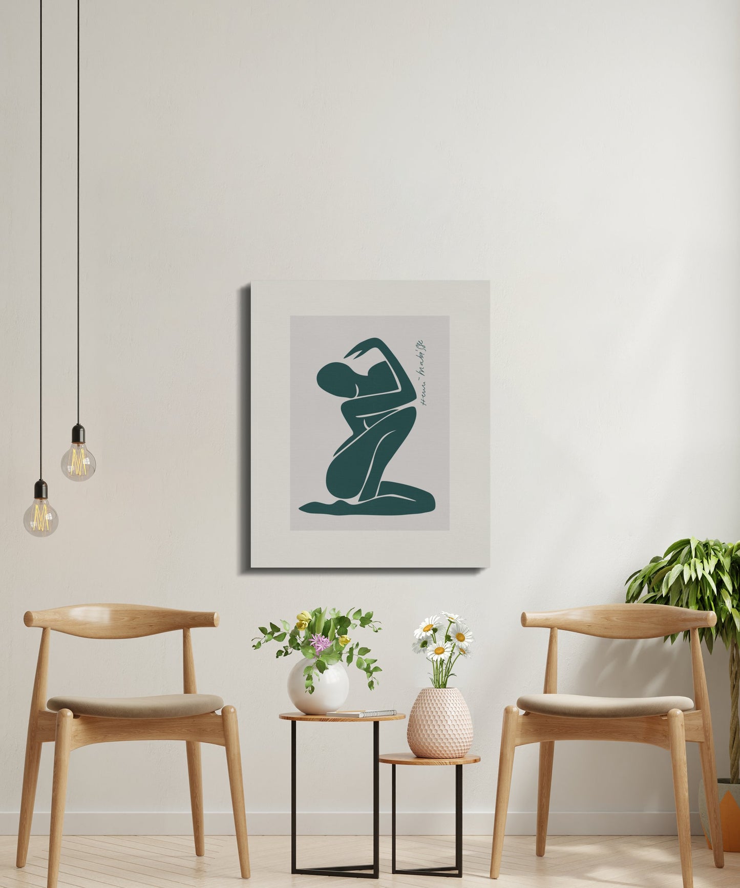 Minimalist art canvas wrap featuring a teal abstract figure, styled in a modern seating area with plants and pendant lights.