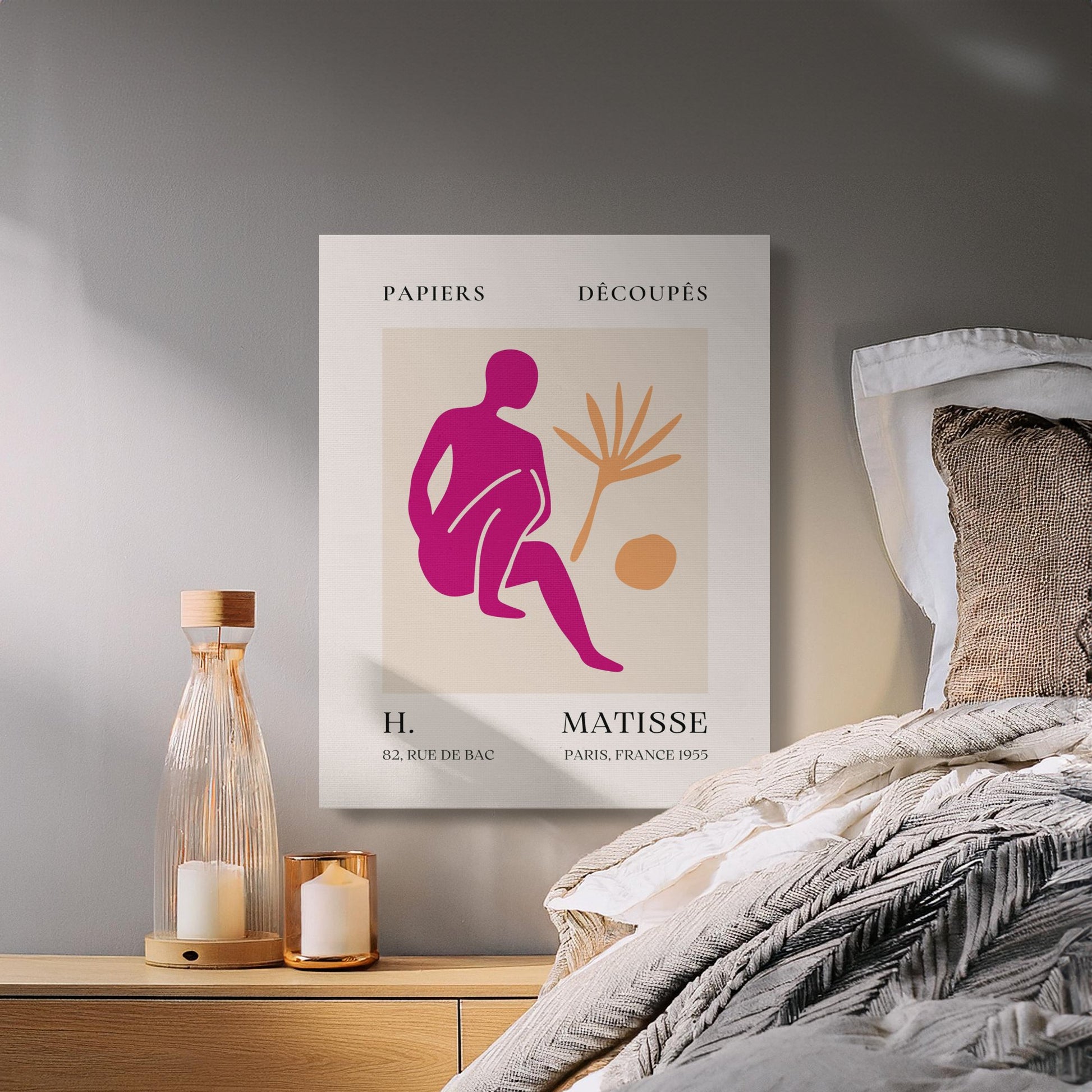 Henri Matisse inspired canvas wrap art hung above a cozy bed, featuring vibrant abstract design and warm bedroom decor.