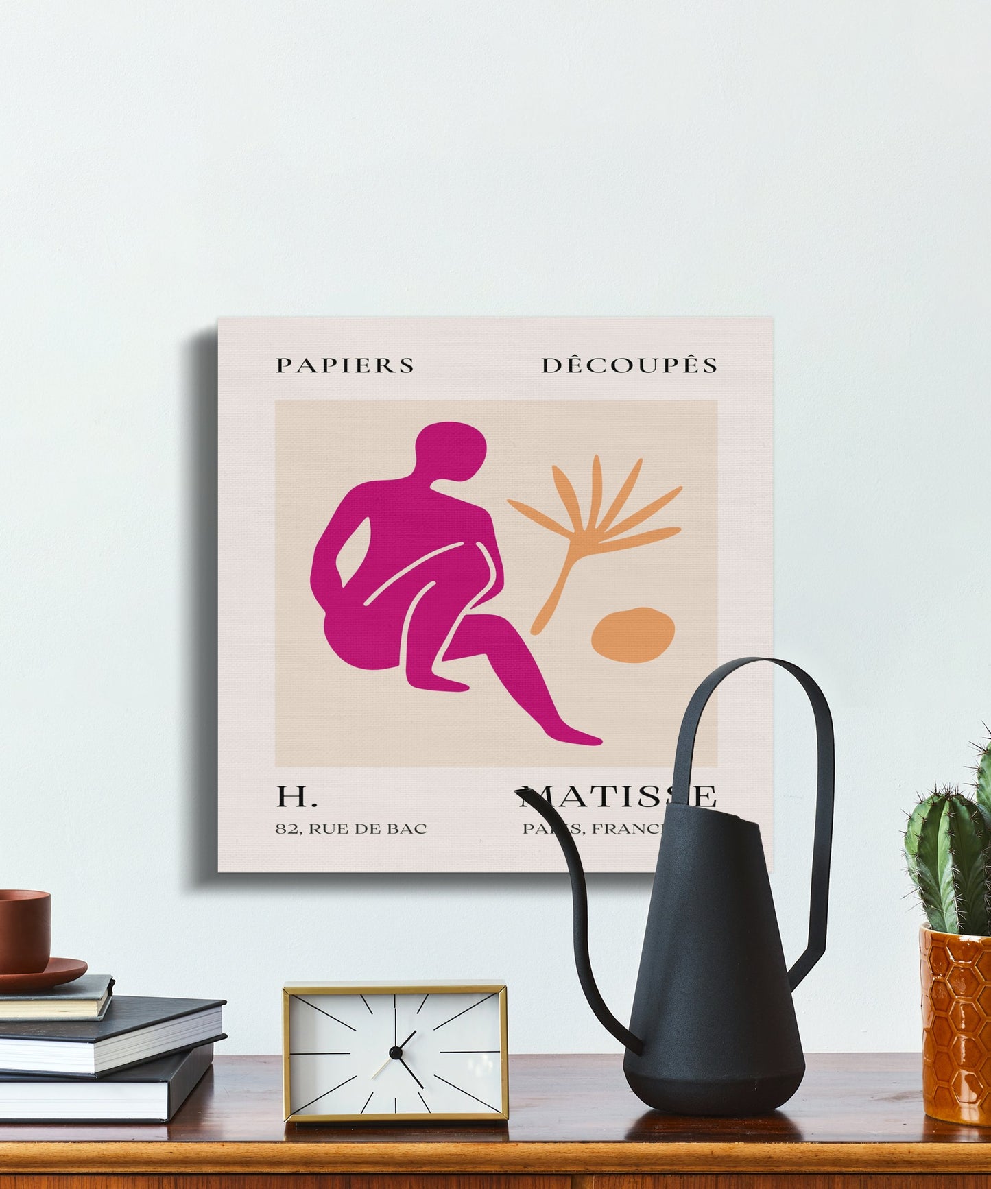 Henri Matisse inspired wall art canvas wrap displayed on a shelf with modern decor, including a black watering can and small plants.