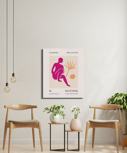 Henri Matisse inspired canvas wrap art in a bright, minimalist room with wooden chairs, a small table, and hanging light bulbs.