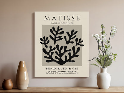Gallery-wrapped Henri Matisse inspired wall art with black and white coral design, styled on a wooden console with vases for contemporary decor.