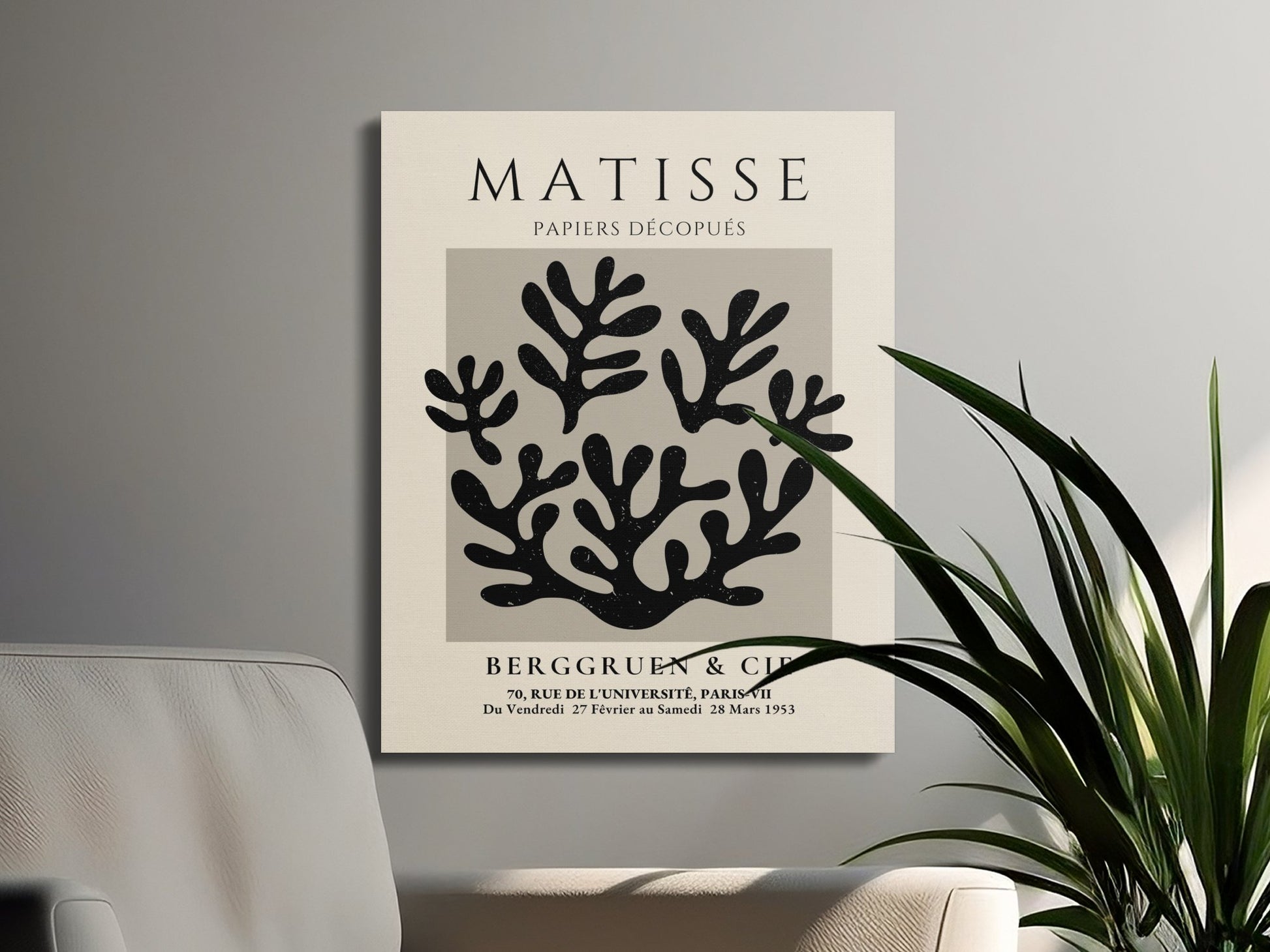 Modern Henri Matisse inspired wall art with coral design on canvas wrap, displayed in a living room with minimalist furniture and greenery.