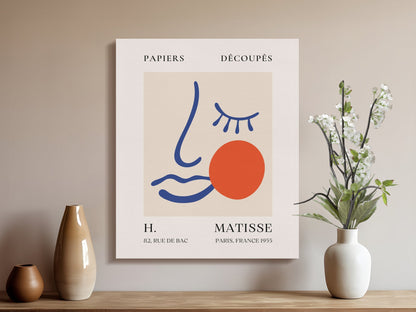 Henri Matisse Papiers Decoupes canvas wrap displayed in a cozy room with vases and flowers, ideal for artsy home decor and statement wall art.