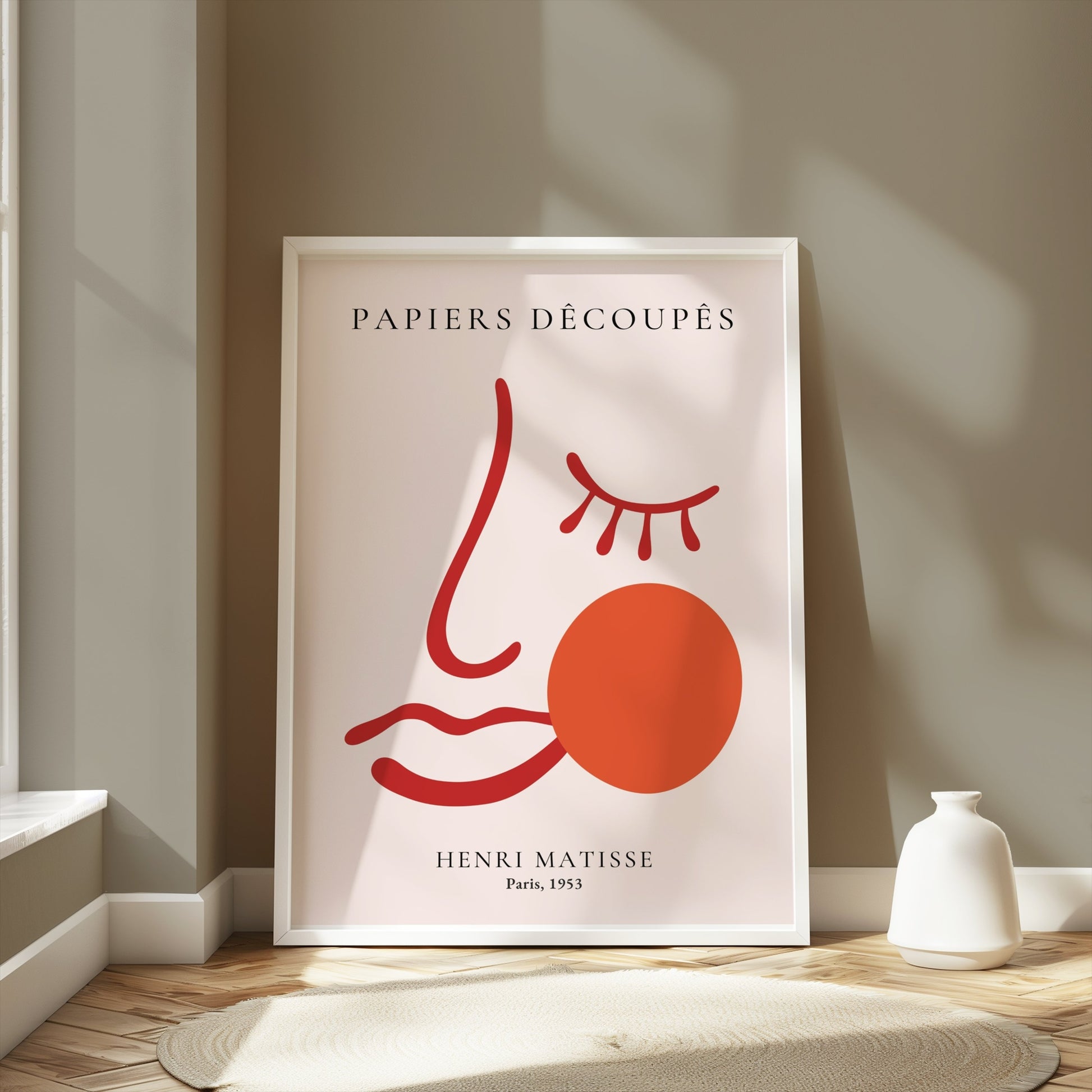 Henri Matisse Papiers Decoupes Paris 1953 art poster in a white frame, styled in a modern room with soft lighting and neutral decor.