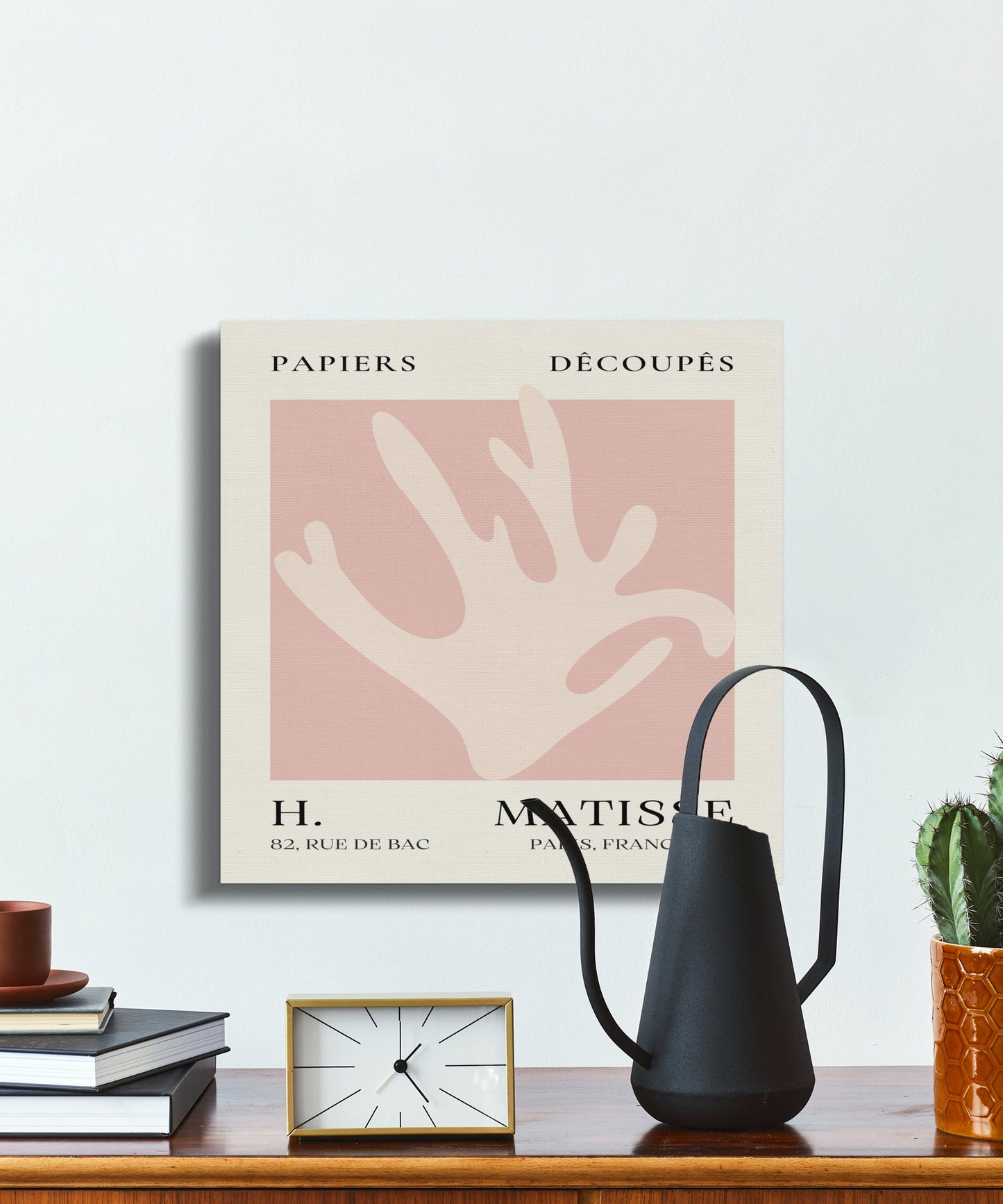 Henri Matisse Papiers Decoupes canvas wrap on a wooden shelf with a watering can, clock, and books, perfect for artistic home decor.